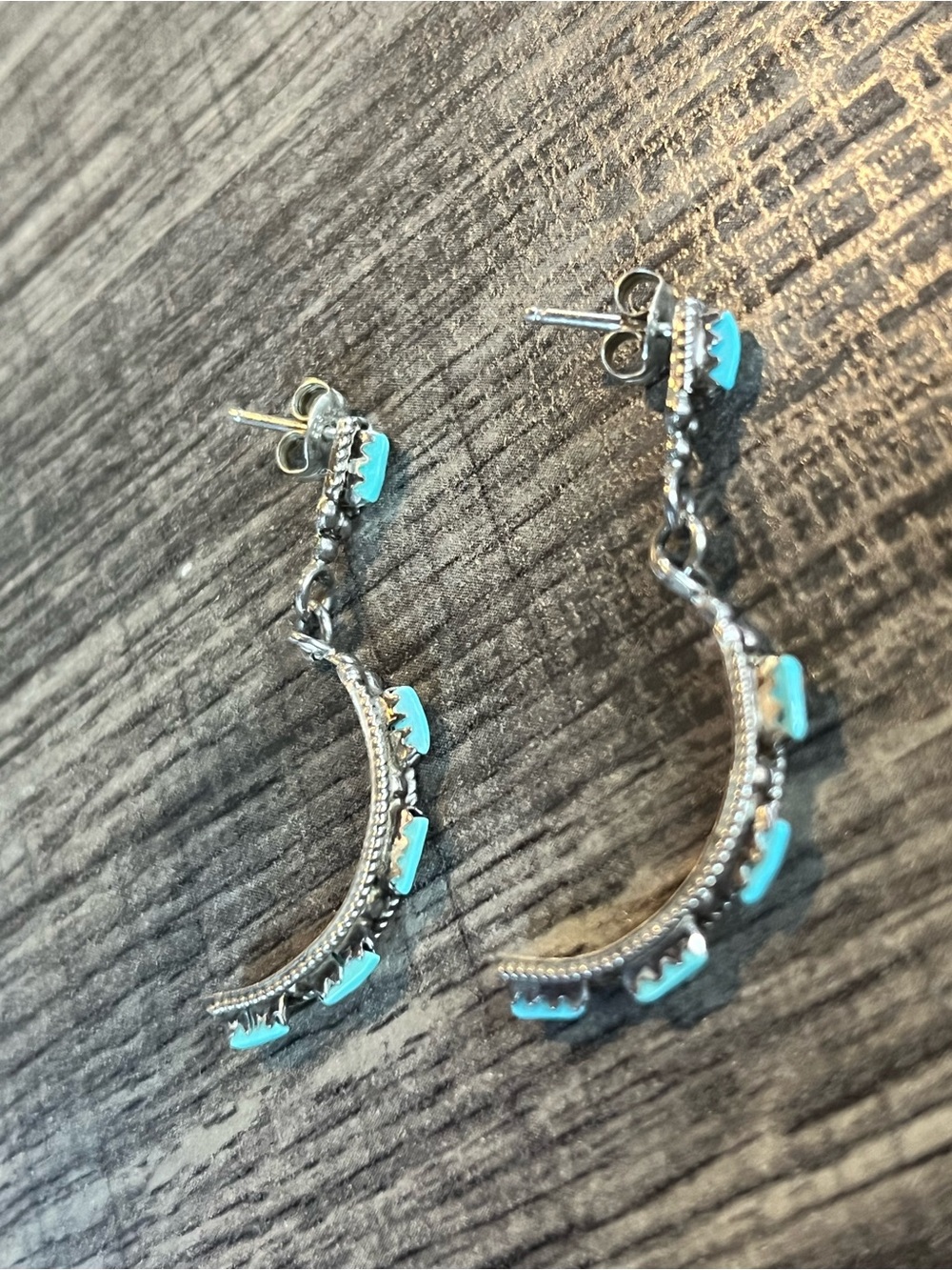 Sterling Silver Dangle half hoops w turquoise stones. Signed Zuni. Native
